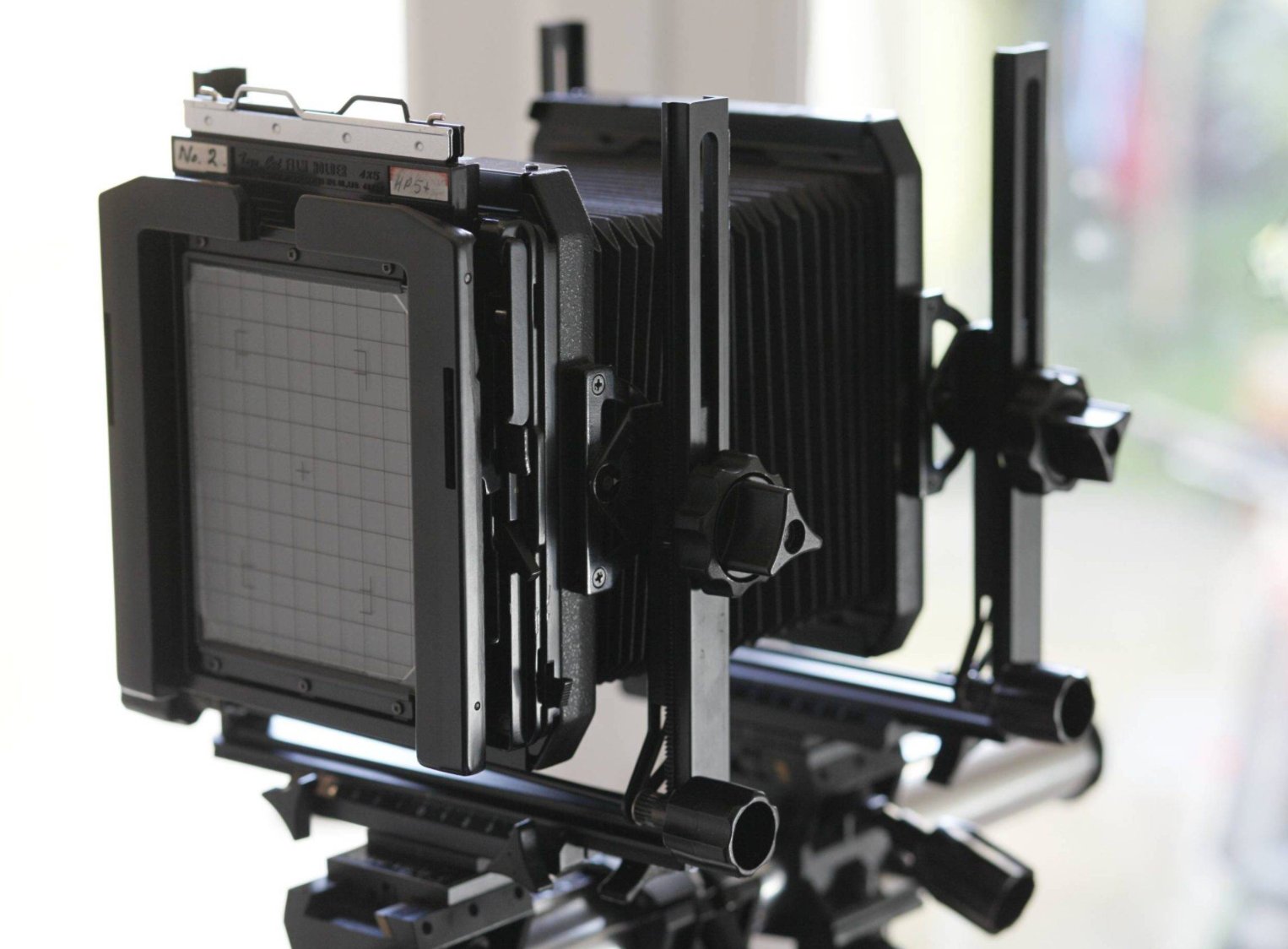 Large-format view camera on a tripod